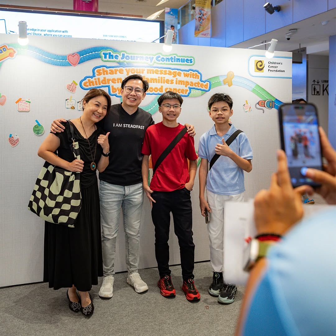 Group photo at the Children's Cancer Foundation booth