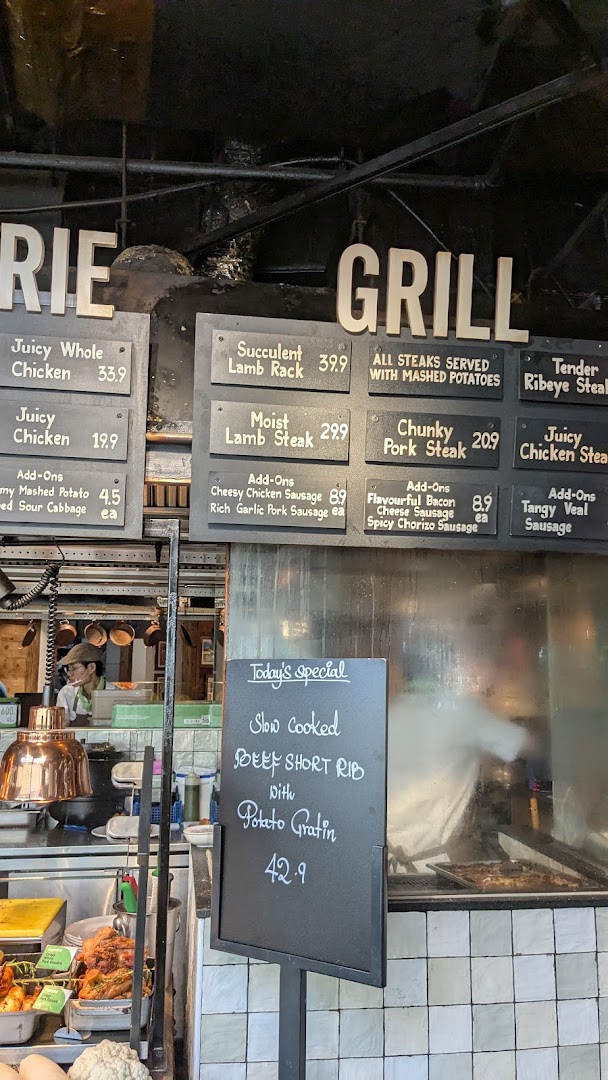 A grill restaurant menu with various meat options and a special dish.