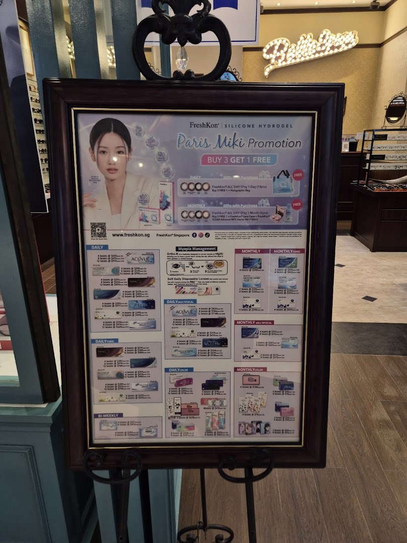 A promotional poster for Paris Miki featuring FreshKon contact lenses and a buy 3 get 1 free offer.